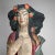This large, hand-carved wooden sculpture is a colorful and striking addition to any interior. The female figure is...
