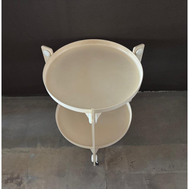 Bar trolley with 2 trays, in white, made by Italian manufacturer Guzzini, and designed by Luigi Massoni. I have official...