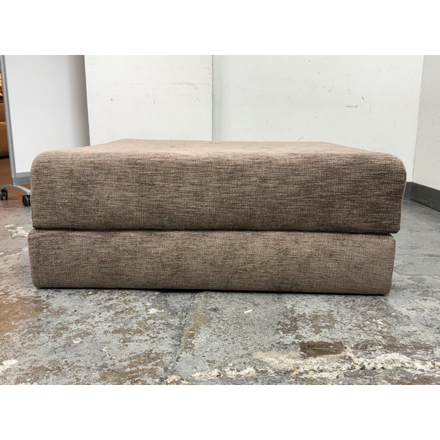 Design Plus Gallery presents a Square and Plush Custom Made Ottoman from Gina Bershneider. The brown, taupe ottoman has...