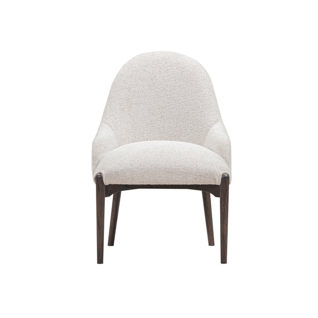 Designed for everyday elegance, the Glendale Dining Chair combines clean lines with comfortable durability. Upholstered in...