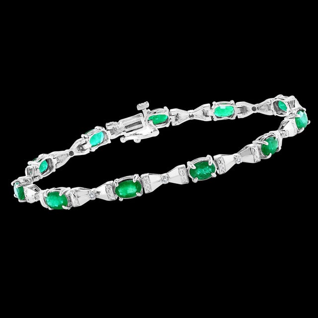 11 Carat Natural Emerald & Diamond Cocktail Tennis Bracelet 14 Karat White Gold For Sale - Image 18 of 18