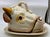 A wonderfully whimsical Victorian Staffordshire majolica serving dish modeled as a charming cow’s head, complete with...