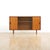 This Mid Century cabinet was produced in England during the 1960s. A wonderful design and excellent storage piece. Made...