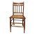 Antique early 20th-century American chestnut side chair featuring a beautifully hand-caned seat, spindle back, and turned...