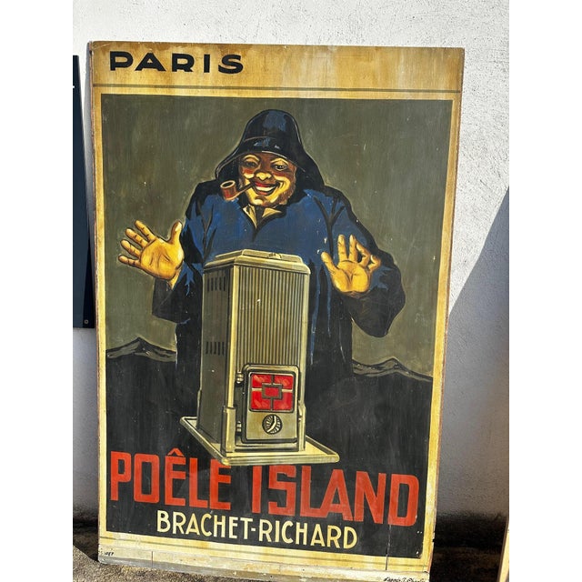 Original French advertising poster produced around 1930 for the Poêle Island stove by Brachet-Richard. A striking example...