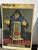Original French advertising poster produced around 1930 for the Poêle Island stove by Brachet-Richard. A striking example...