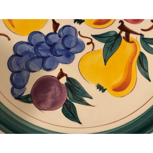 Beautiful vintage Stangl Pottery “Fruit” 14½-inch Chop Plate, hand-painted in Trenton, New Jersey. Featuring vibrant...