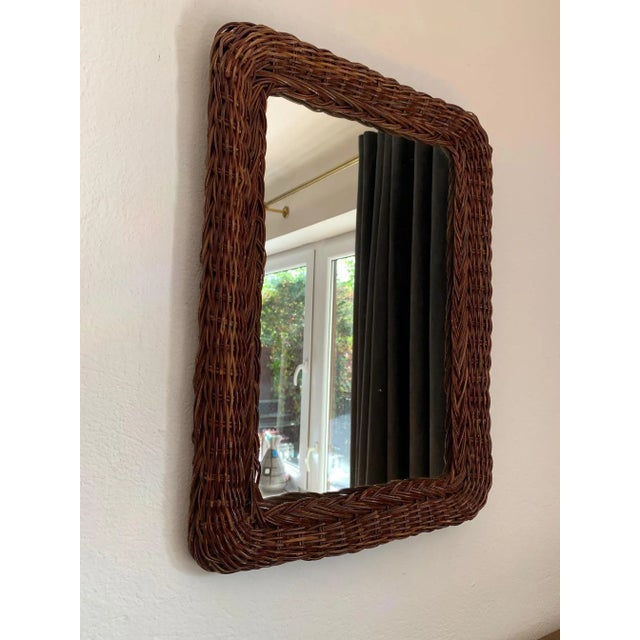 Italian wicker mirror from the 1960s In original and good condition. Classic, simple and at the same time attractive form.