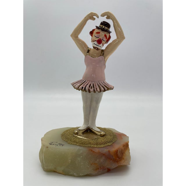 Bring a touch of theatrical charm and artistry to your collection with this vintage Ron Lee Ballerina Clown sculpture,...