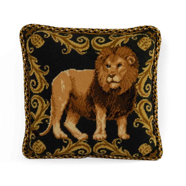 Expertly crafted vintage needlepoint pillow featuring a majestic lion centerpiece surrounded by an elegant scroll border...