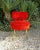1960's French Mid Century Modern Red Fluffy Side Chair. Fine for a vanity. Gilt tone legs.