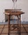 A 19th century Aesthetic Movement bamboo lamp table featuring an octagonal woven top supported by a geometric bamboo...
