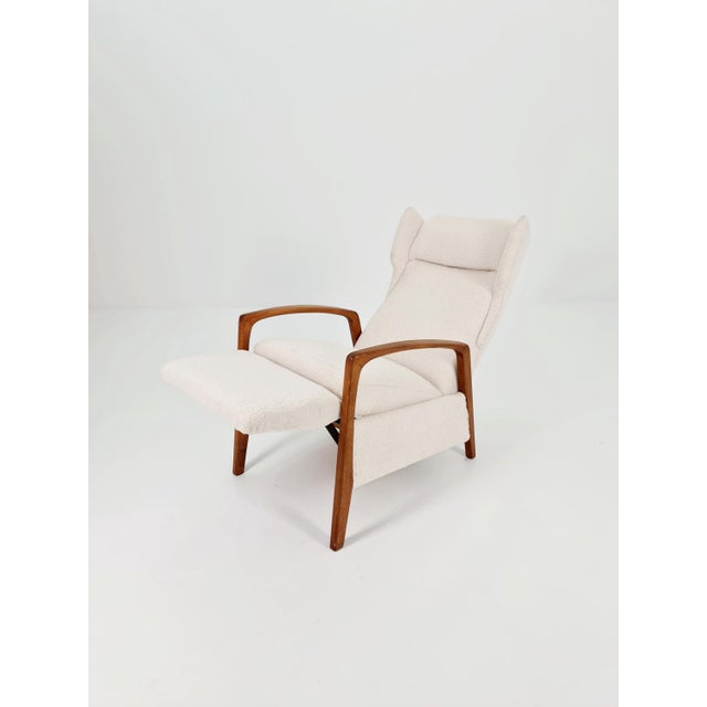 German lounge chair with footrest, 1940s, made in west germany. Upholstered seats completely restored with high-quality...