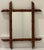 A charming, petite in scale, antique French wall mirror featuring faux bamboo frame. ****There is currently no hardware on...
