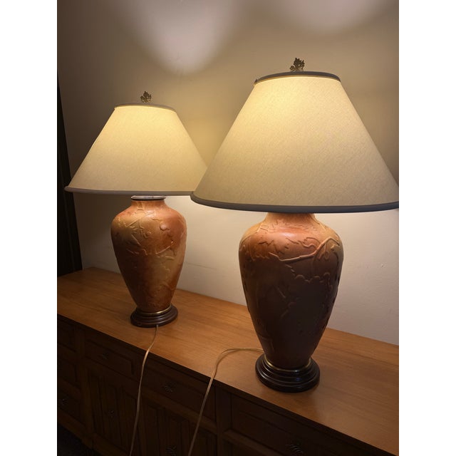 Elevate your space with this elegant pair of authentic Wildwood table lamps. Featuring warm wood bodies, solid brass...