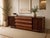Awesome large midcentury modern credenza, sideboard, or media cabinet from Lane Furniture. This piece is from the Lane...