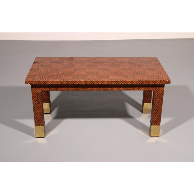 Great Harrison Van-Horn Brass and Raffia Hollywood Regency coffee table in excellent condition. The table feels lovely and...