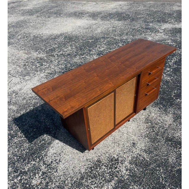 Mid century sideboard or credenza in great shape and ready for another lifetime of use! We refinished the top to really...