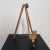 A vintage Italian Florentine-style tabletop easel, beautifully finished in distressed cream with gilt gold accents. The...