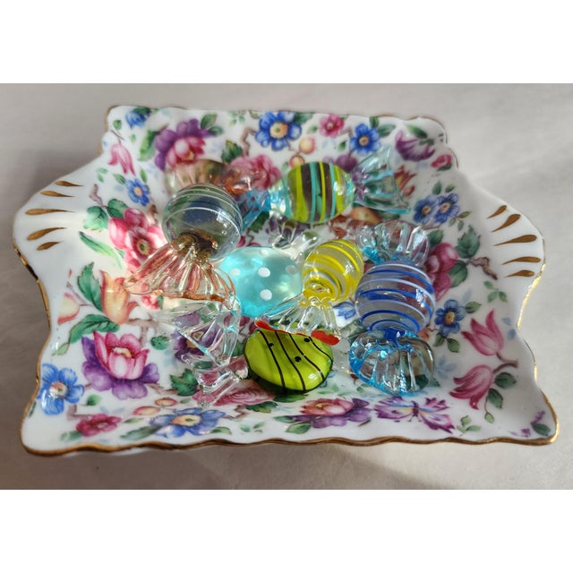 This antique Staffordshire Bone China petite English dish is a lovely sprinkling of pastel flowers trimmed in hand-gilded...