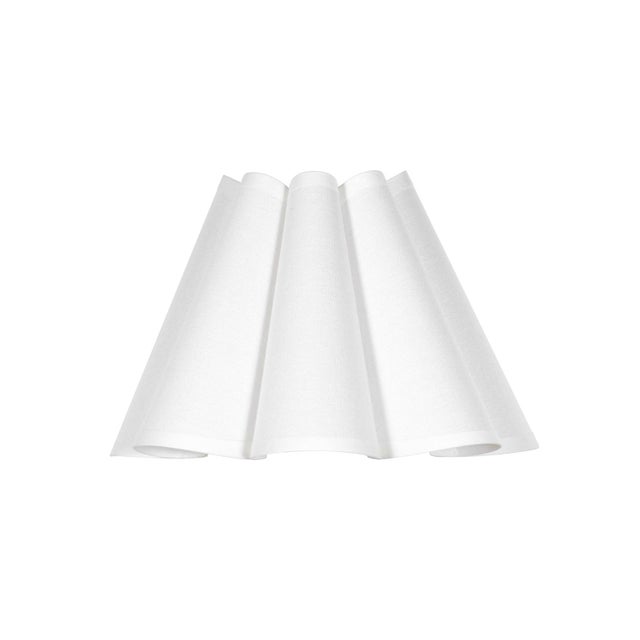 Crafted from linen in a soft Linen hue, the Polly Alternate Shade features a gently scalloped form that adds quiet...
