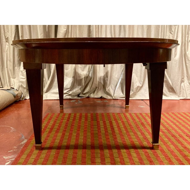 Wowza! This table is the epitome of French Art Deco design. I love the fanned mahogany veneers on the end that give the...