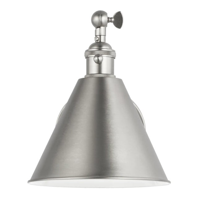 The Salem one light wall sconce in brushed nickel offers shadow-free lighting in your powder room, spa, or master bath...