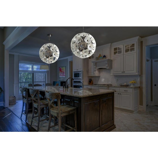 Sputnik space age Italian vintage crystal chandeliers made by 51 transparent crystals in a burnished brass metal frame....