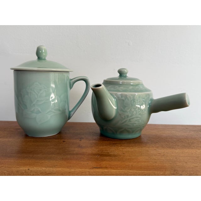 This Asian tea pot and cup with lid are in a beautiful celadon green. No makers mark. Measurements listed are for the tea...