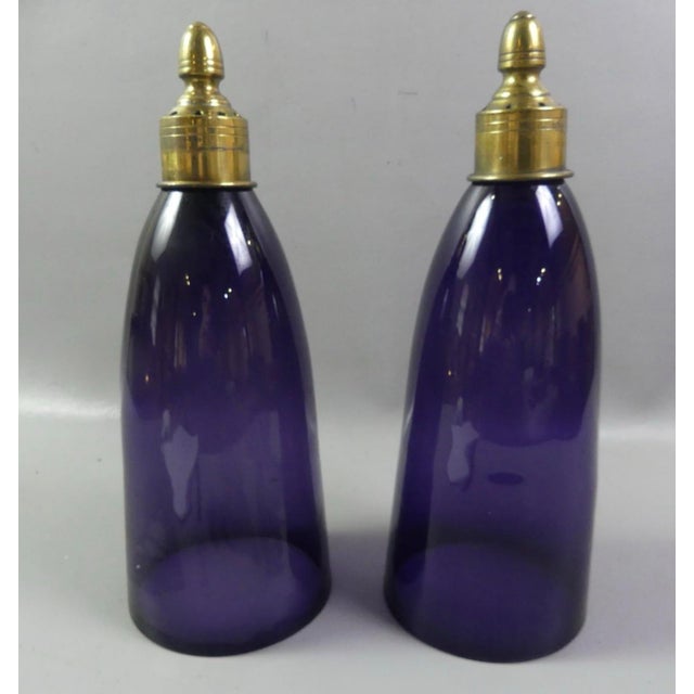 A rare pair of Regency Period Amethyst glass hurricane wall sconces in a a deep (royal) violet. In excellent condition...