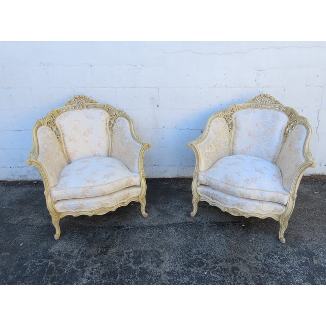 This Pair of Side Chairs is made of wood, solid wood, and upholstery. These two chairs have exquisitely elegant French...