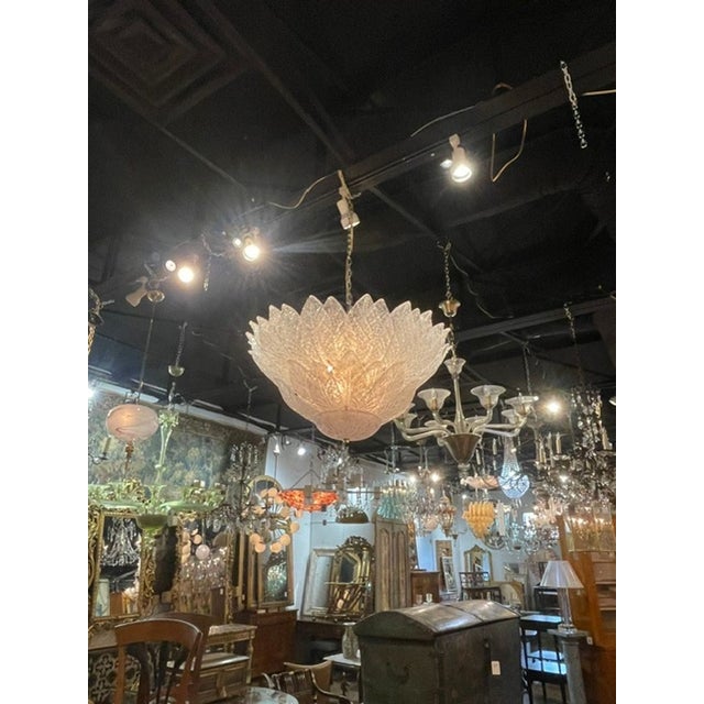 The Modern Murano Granola Glass Leaf Chandelier is a stunning piece of home decor. The chandelier features intricate...