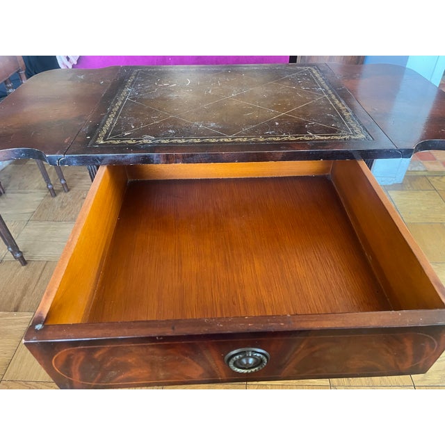 This piece is a true vintage style! Could have multiple uses! I’ve even used it as a writing desk. Scratches and wear...
