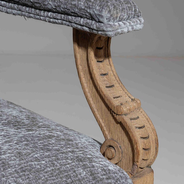 This armchair makes its impression through dark wood frame, blue-gray upholstery. Originating in France during 1970s, it...