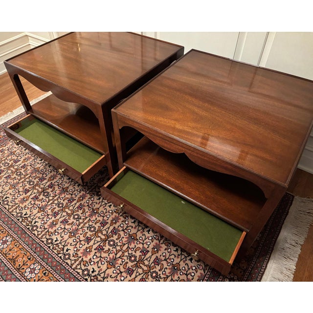 A pair of stylish MCM walnut side tables. Beautiful figural grain tops, slightly recessed to hold custom glass for...