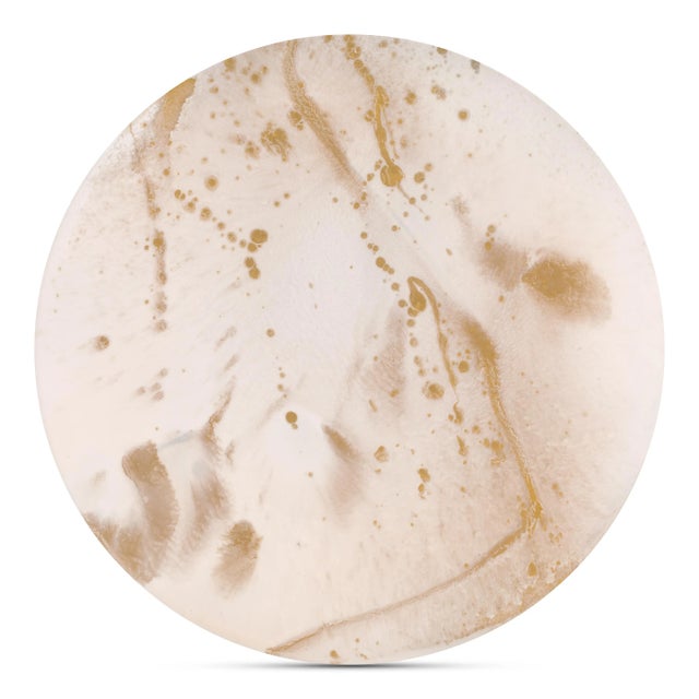 Unique, round shaped coffee table. The table top contains metal particles under the varnished top coat, which gives...