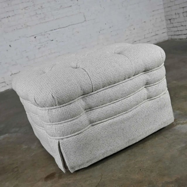 Wonderful vintage Brunschwig & Fils St. Andrews tufted ottoman on four hooded ball casters with Robert Allen Avanzata...