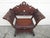 A good looking antique Moroccan inlaid chair, c.1900 Having a peaked back and sweeping curved arms and ample room for...