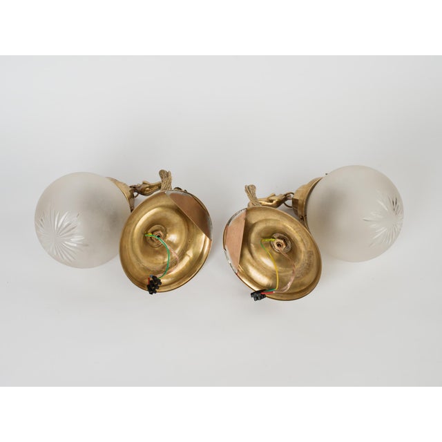 1950s Spanish Empire Chased Brass Swan Wall Sconces With Starburst Frosted Globes - A Pair For Sale - Image 6 of 13