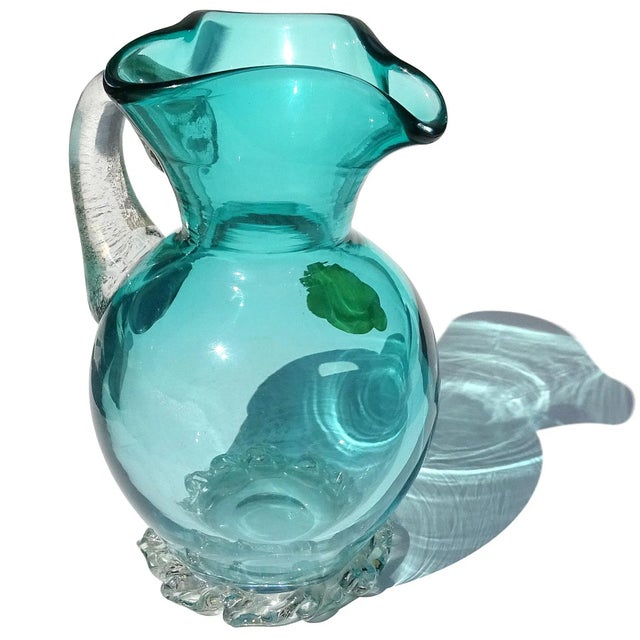 Beautiful vintage Murano hand blown aqua blue and gold flecks Italian art glass pitcher shape flower vase. Documented to...