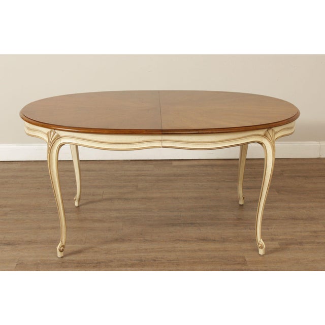 High Quality Vintage Oval Book-Matched Starburst Walnut Top Expandable Dining Table on Carved and Painted Base, Includes...