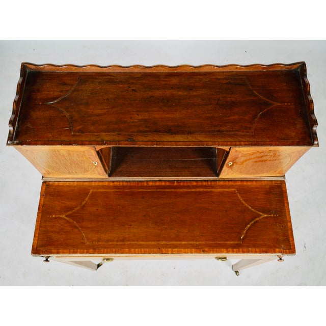 An elegant English Regency writing desk or writing table with fitted superstructure, dating to the early 19th century,...