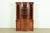 A gorgeous bow front Georgian or Chippendale style breakfront bookcase or dining cabinet In the manner of Baker Furniture...