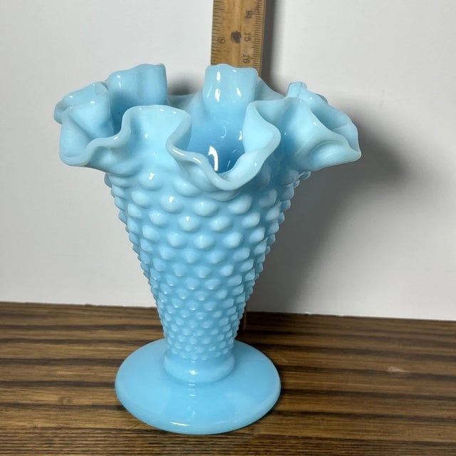 Lovely vintage Fenton Art Glass Company hobnail milk glass vase in a beautiful pastel blue shade. This elegant piece...