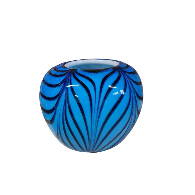 DUTIES FREE An object that embodies history, material, and light. This Fenicio Murano glass vase is born from the meeting...