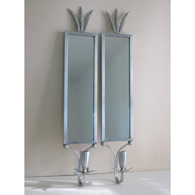 A stunning and rare pair of 1930s forged aluminum wall sconces by palmer smith. Lighting by palmer smith is exceedingly...