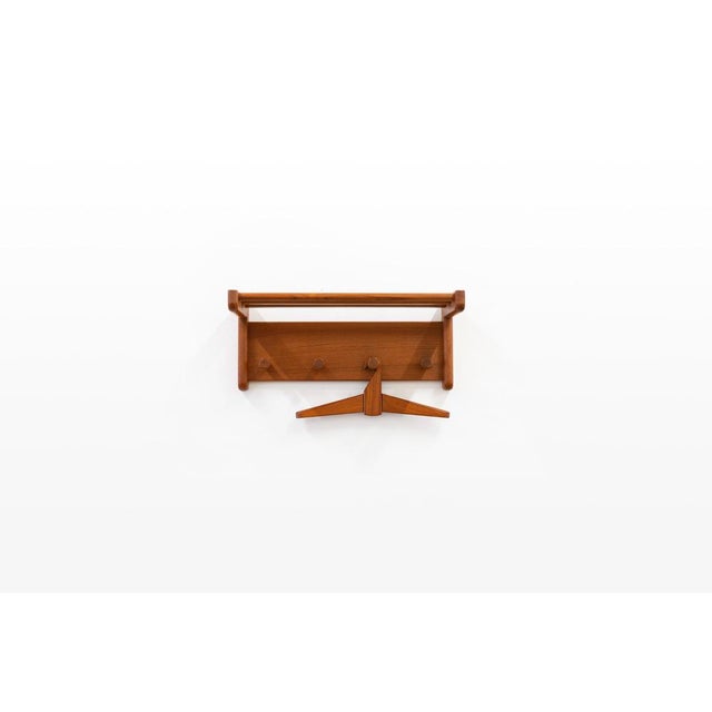 Danish vintage coat rack by Aksel Kjersgaard. The coat rack is made of teak wood. It can be easily mounted on the wall and...