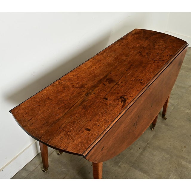 French 19th Century Walnut Oval Drop Leaf Dining Table For Sale - Image 4 of 11