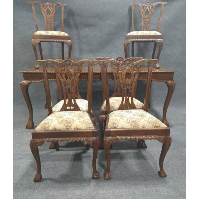 Introducing our Customizable Chippendale Style Dining Set, complete with an antique dining table and six chairs. This...