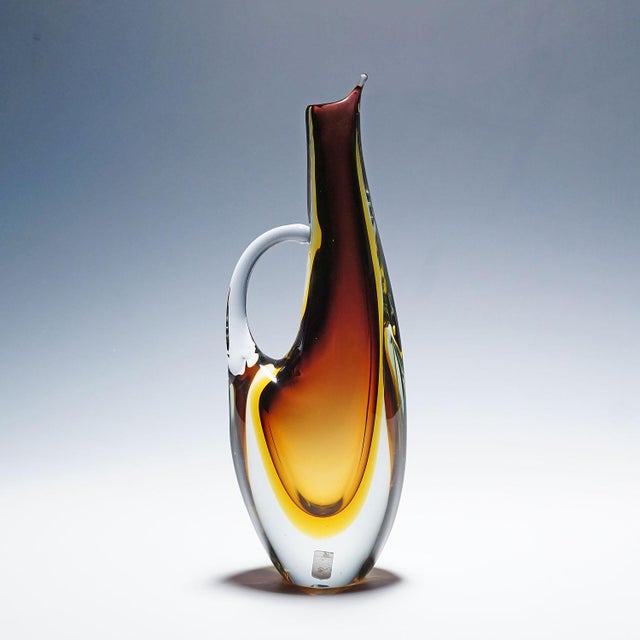 Vintage Murano Sommerso Glass Jug by Arte Nuova 1950s A vintage art glass jug made of thick amber and yellow Sommerso...